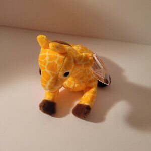 "Twigs" the Giraffe is a beloved Ty Beanie Baby featuring a bright yellow body w